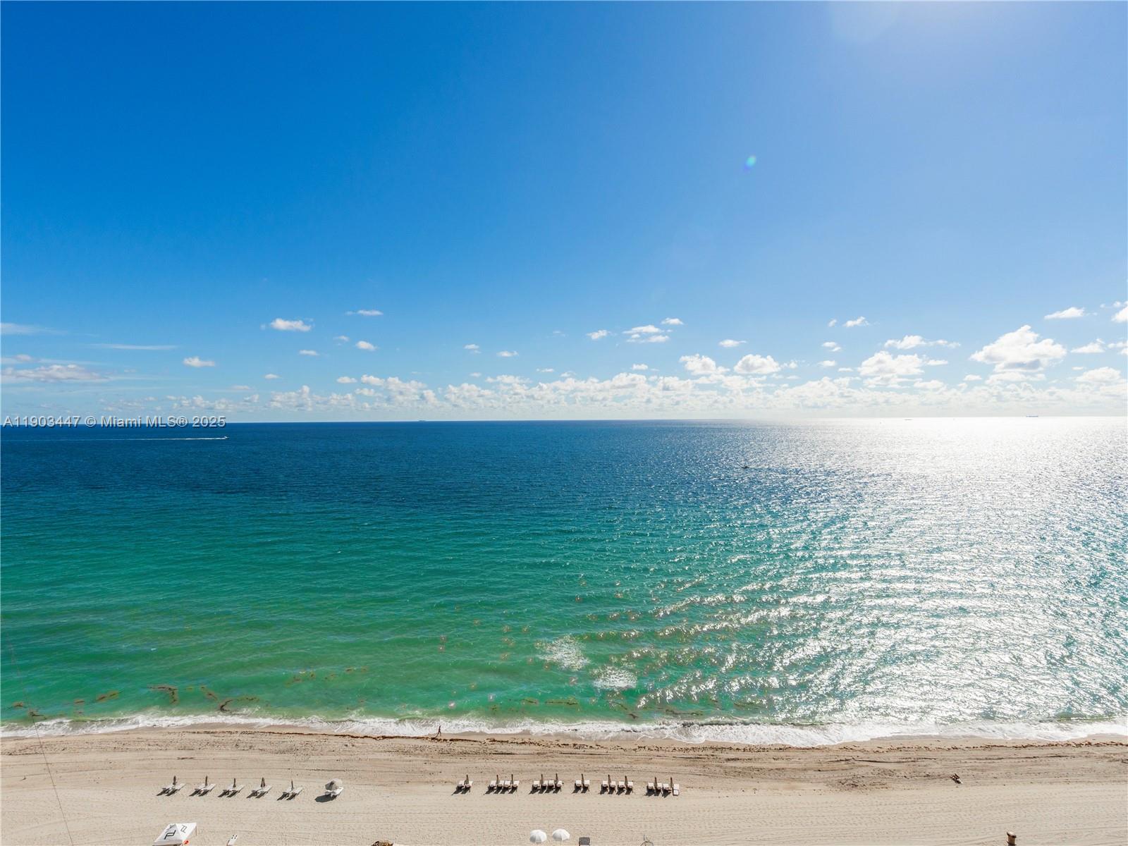 18501 Collins Avenue, Unit 1501 Sunny Isles Beach, FL 33160 - Photo 8 of 35 a view of an ocean beach
