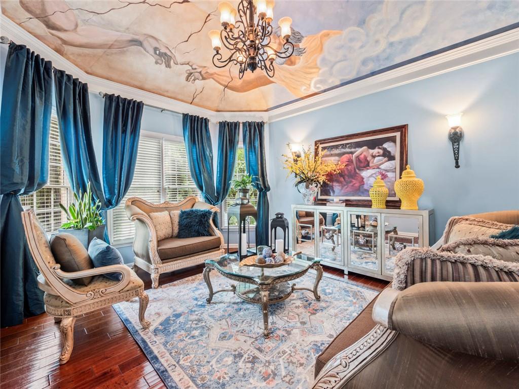 7060 Summit Ridge Chase Cumming, GA 30041 - Photo 13 of 58 a living room with furniture and a large window