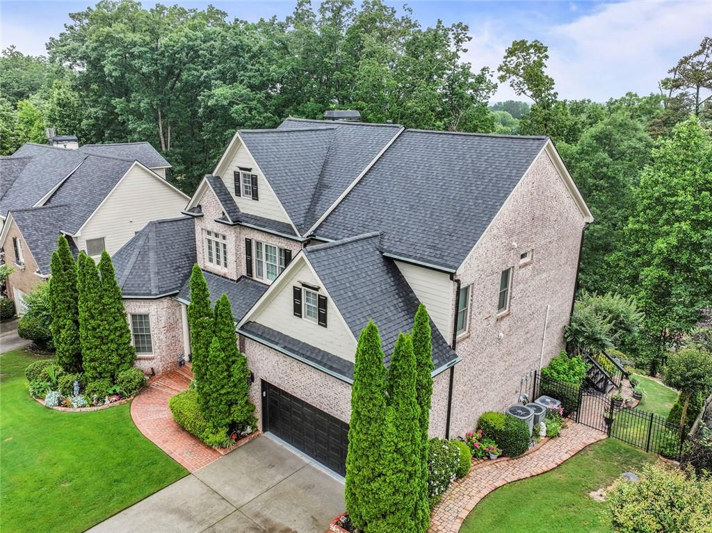7060 Summit Ridge Chase Cumming, GA 30041 - Photo 4 of 58 an aerial view of a house