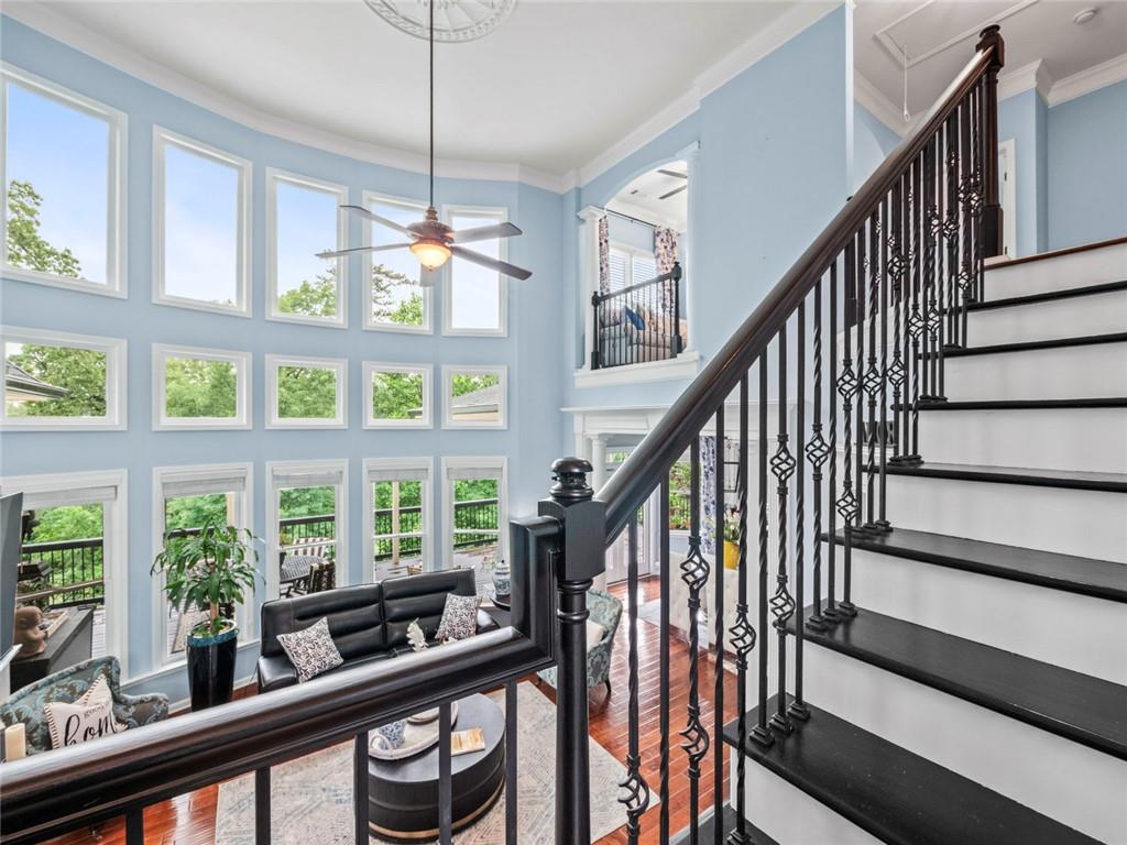 7060 Summit Ridge Chase Cumming, GA 30041 - Photo 58 of 58 a view of an entryway with wooden floor and stairs