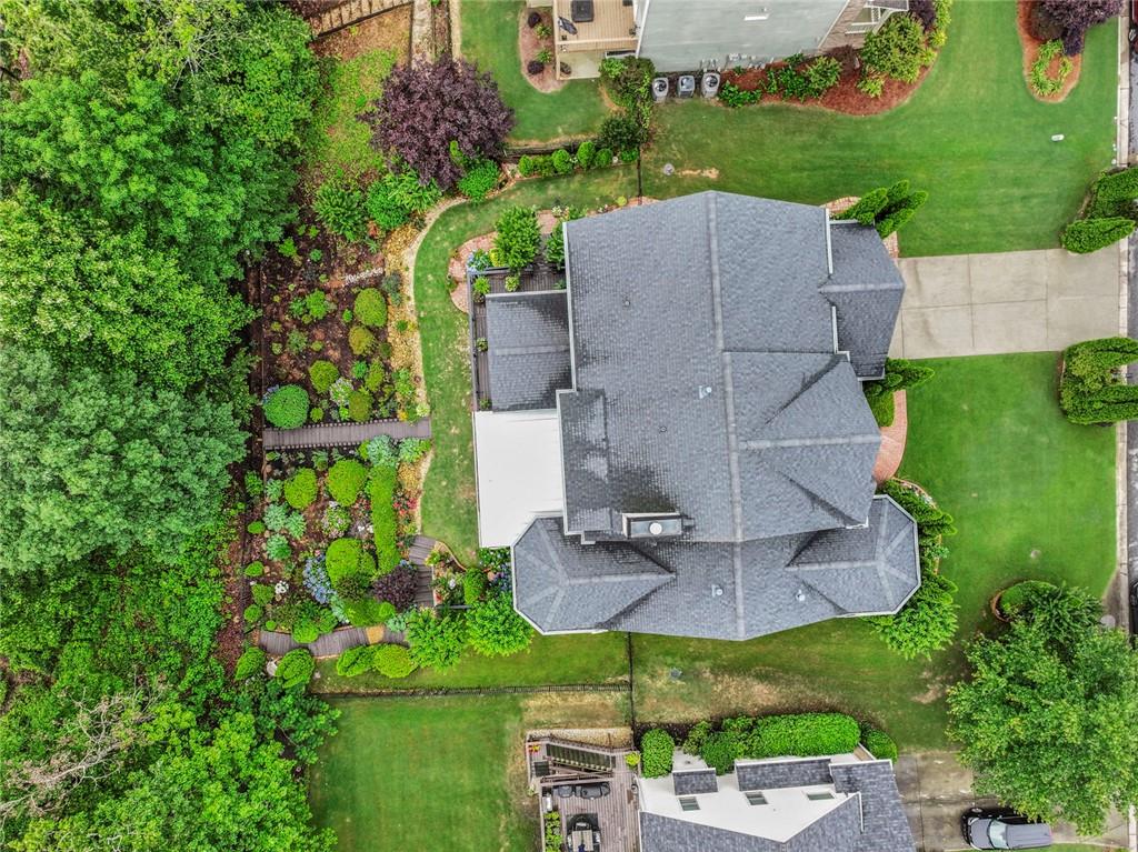 7060 Summit Ridge Chase Cumming, GA 30041 - Photo 8 of 58 an aerial view of house with yard