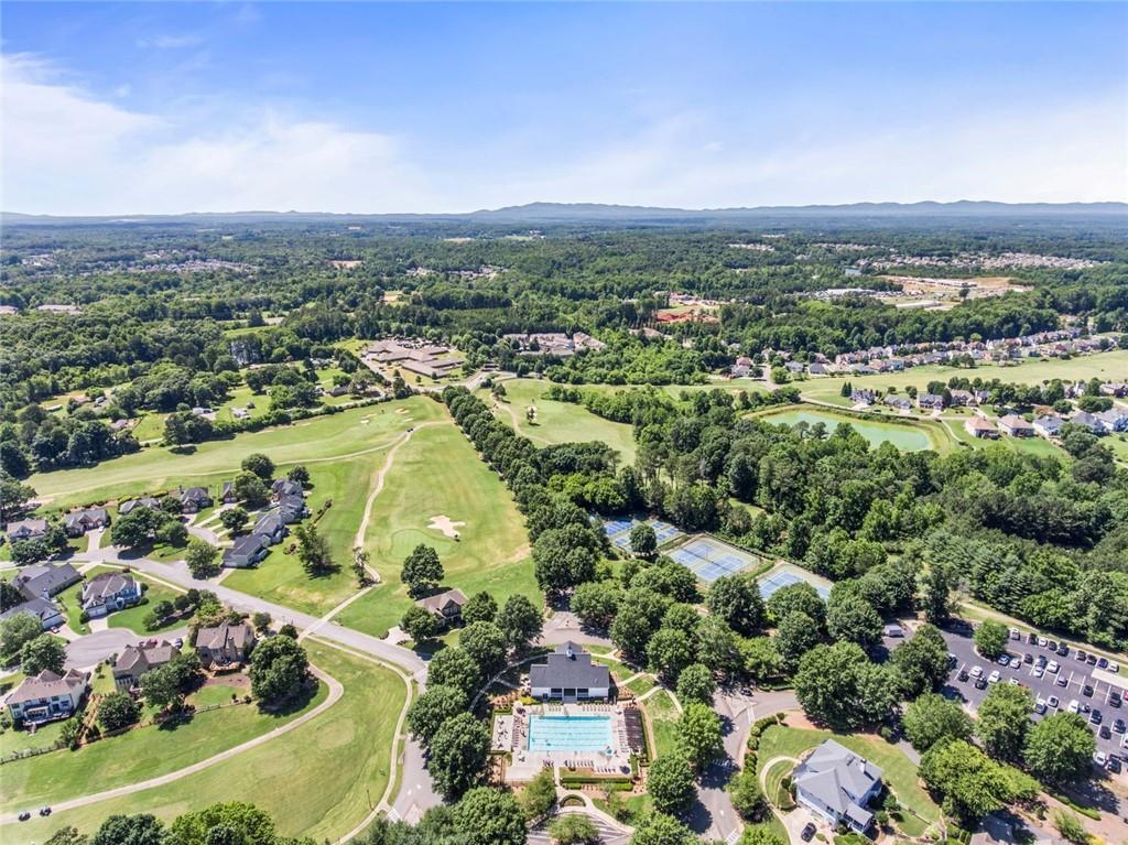 7060 Summit Ridge Chase Cumming, GA 30041 - Photo 10 of 58 an aerial view of a houses with a swimming pool