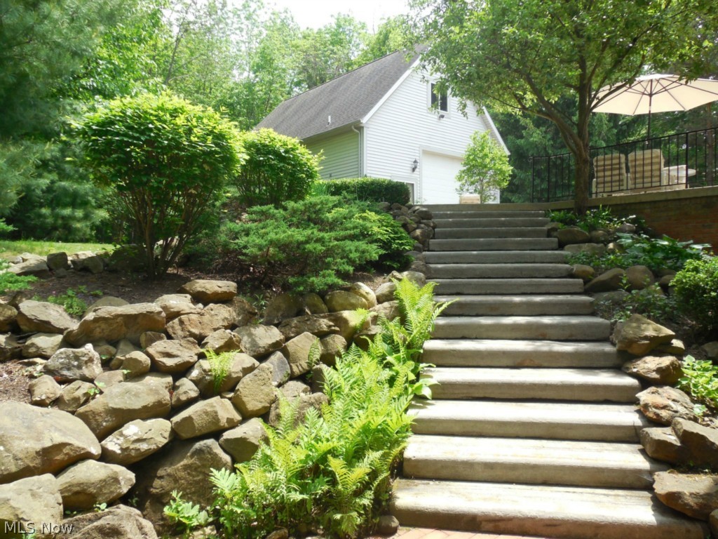7071 Liberty Road Solon, OH 44139 - Photo 21 of 25 Walkout and up to ground level-steps are former curbs from street in Beachwood