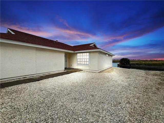 a view of backyard of house