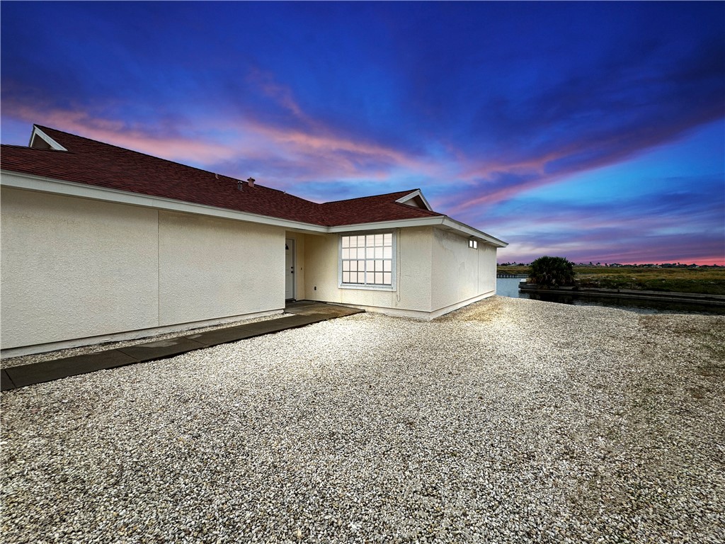 14302 Cruiser Street, Unit B Corpus Christi, TX 78418 - Photo 6 of 25 a view of backyard of house
