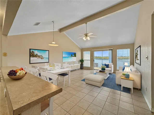a living room with furniture and a table
