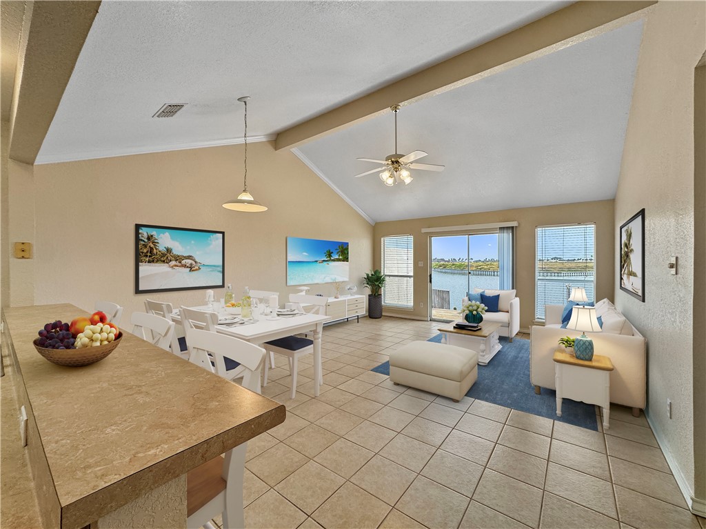 14302 Cruiser Street, Unit B Corpus Christi, TX 78418 - Photo 8 of 25 a living room with furniture and a table