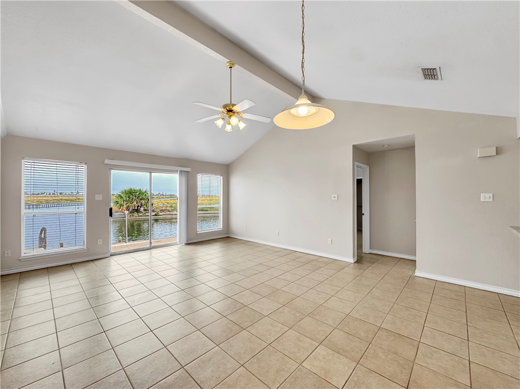 14302 Cruiser Street, Unit B Corpus Christi, TX 78418 - Photo 9 of 25 a view of an empty room and window