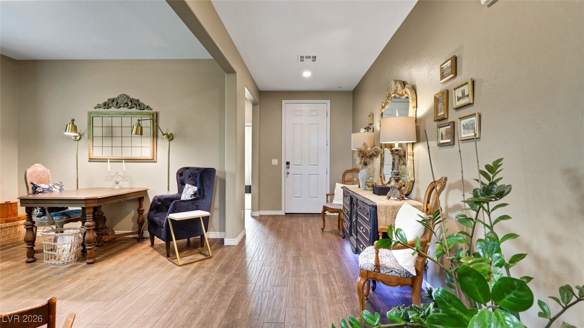 1094 Langston Ranch Avenue Henderson, NV 89002 - Photo 12 of 70 Entryway featuring light wood-style flooring and recessed lighting