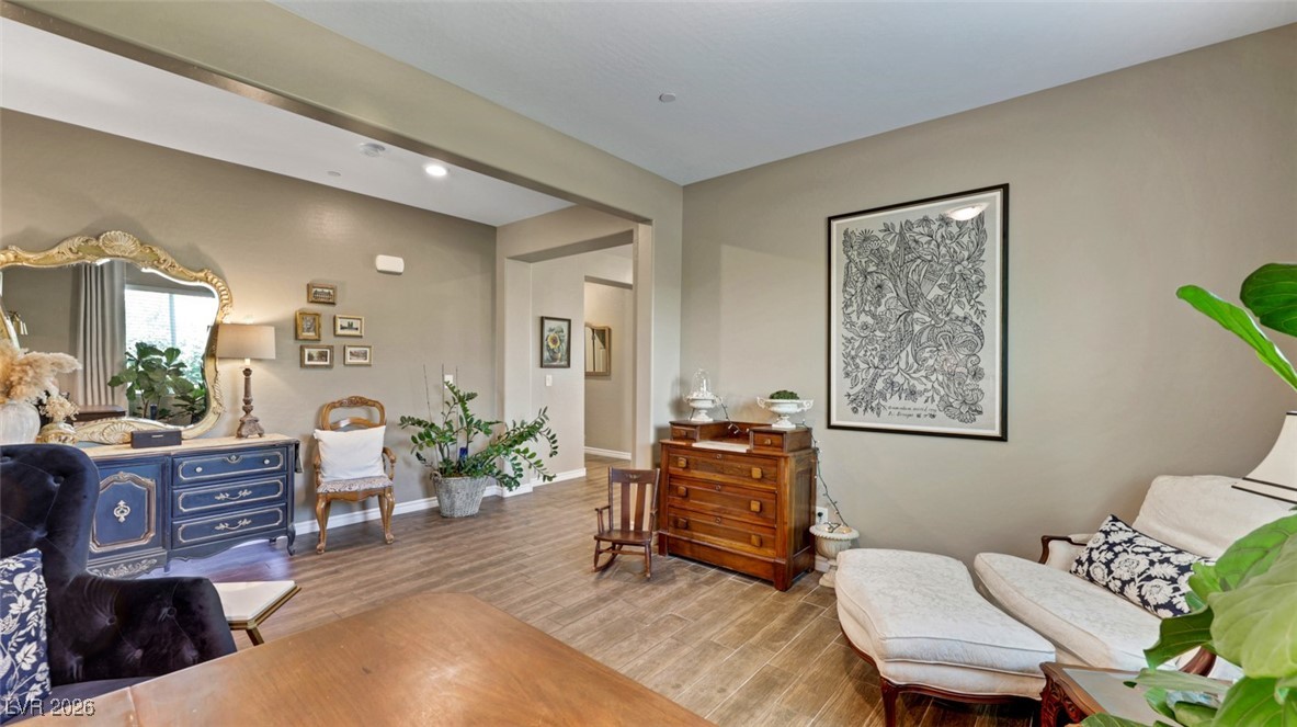 1094 Langston Ranch Avenue Henderson, NV 89002 - Photo 18 of 70 Sitting room featuring wood finished floors and baseboards