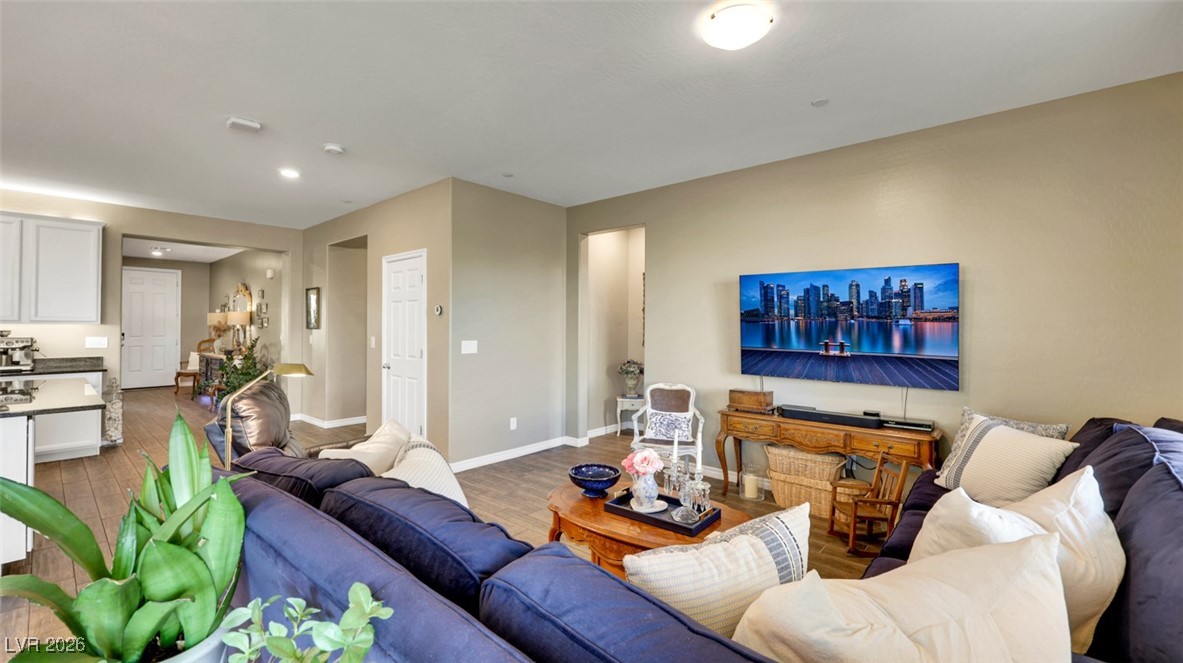 1094 Langston Ranch Avenue Henderson, NV 89002 - Photo 27 of 70 Living area with wood finished floors and recessed lighting