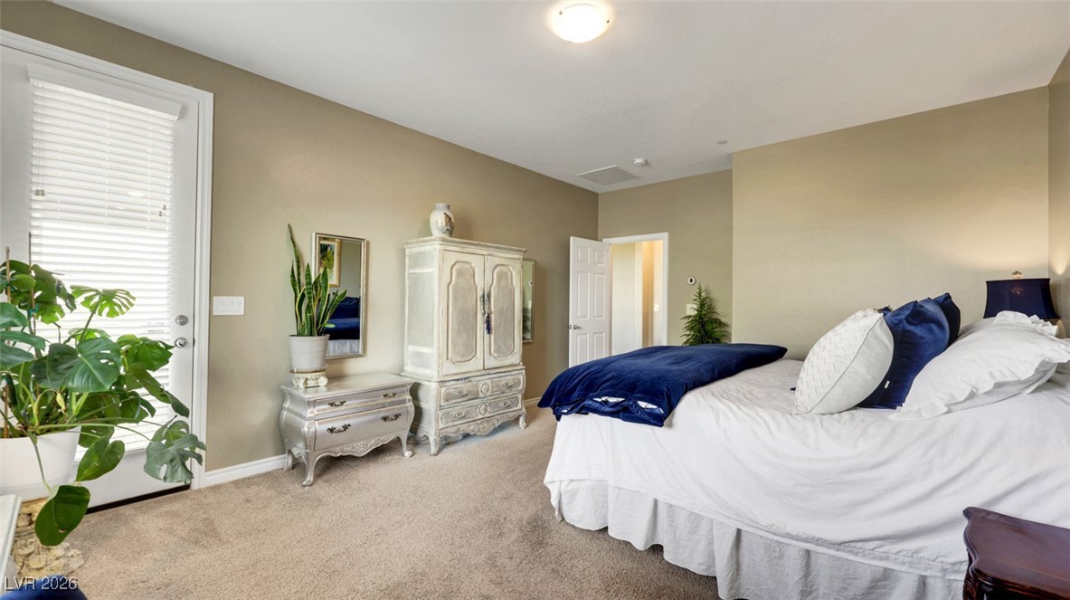 1094 Langston Ranch Avenue Henderson, NV 89002 - Photo 44 of 70 Bedroom with carpet flooring and baseboards