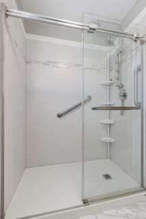 a view of a room with shelf on the wall