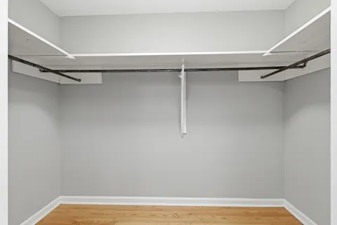 a view of a hallway with windows