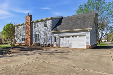 a view of backyard with green space