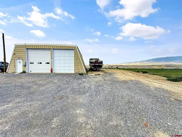 a view of a big room with wooden fence
