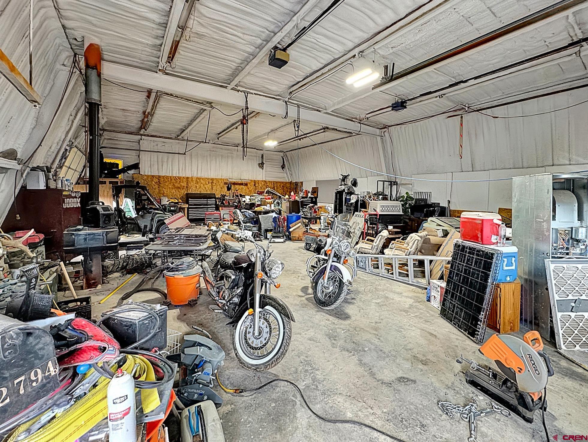 9159 Highway 65 Austin, CO 81410 - Photo 17 of 33 a view of a storage room with a lot of stuff and toys