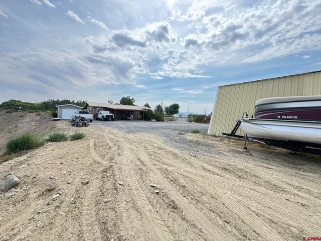 a view of a terrace with yard