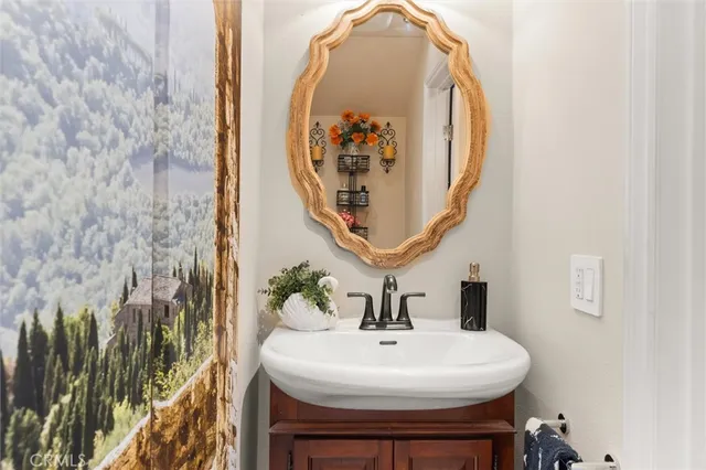 a view of a hallway with entryway wooden floor and front door