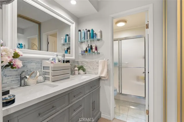 a bathroom with a shower and a toilet