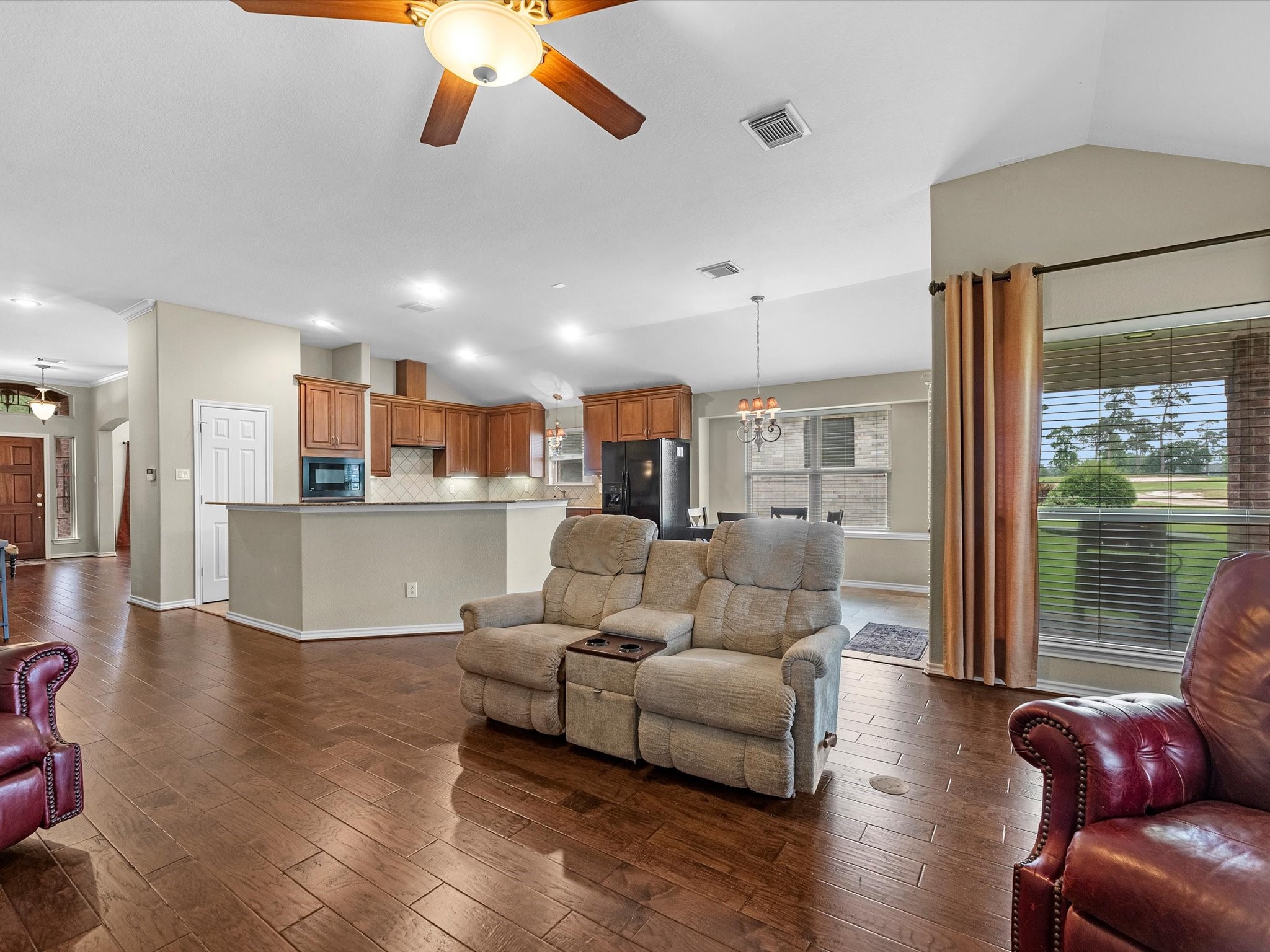 19019 Relay Road Humble, TX 77346 - Photo 12 of 31 a living room with furniture and kitchen view