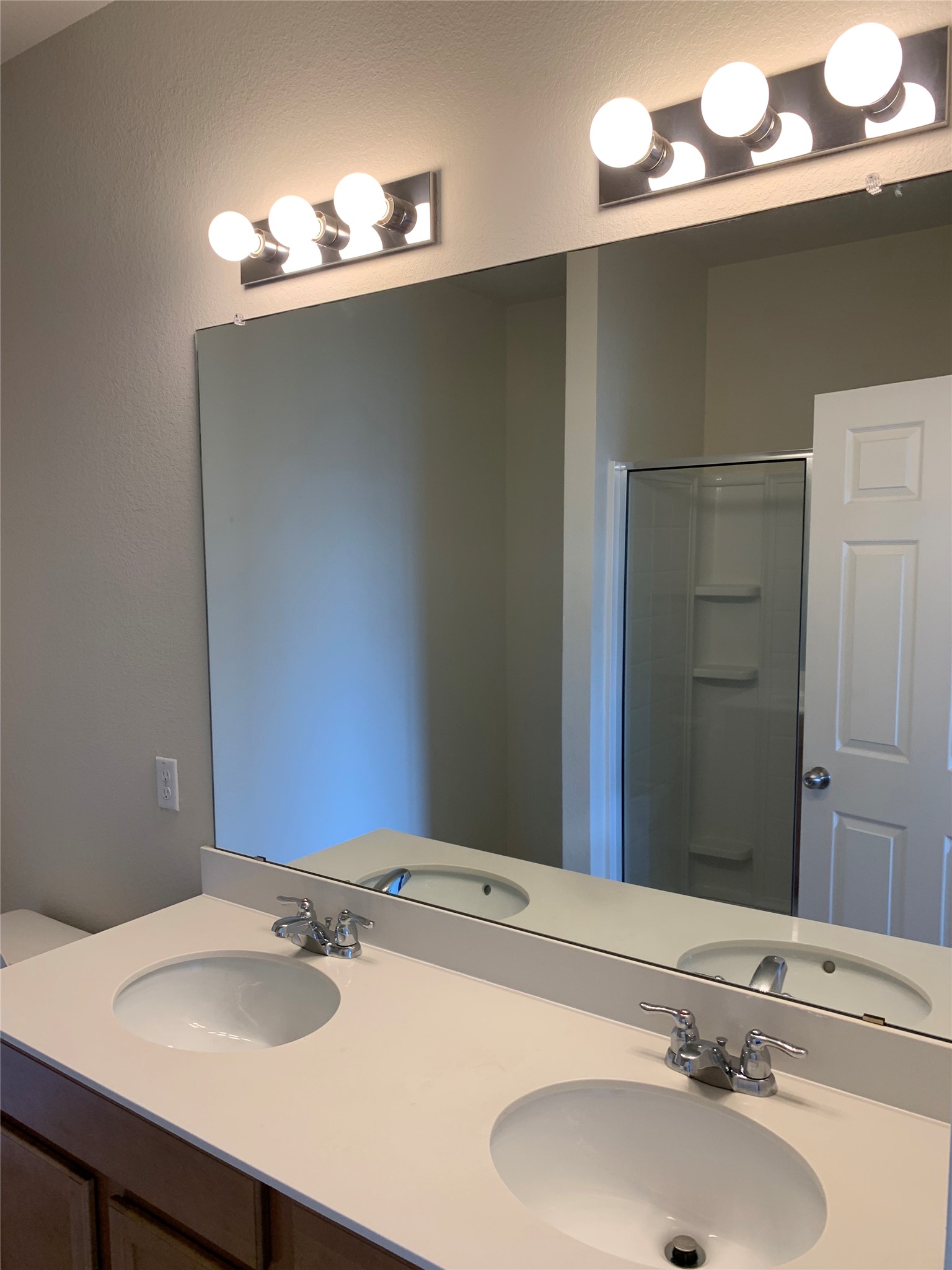 113 Sierra Mar Loop Leander, TX 78641 - Photo 12 of 22 a bathroom with a sink and a mirror