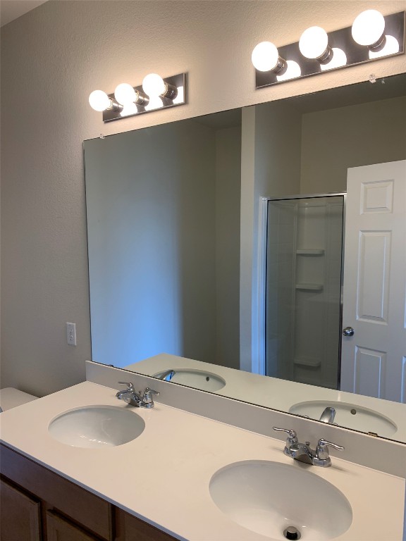 113 Sierra Mar Loop Leander, TX 78641 - Photo 12 of 22 a bathroom with a sink and a mirror