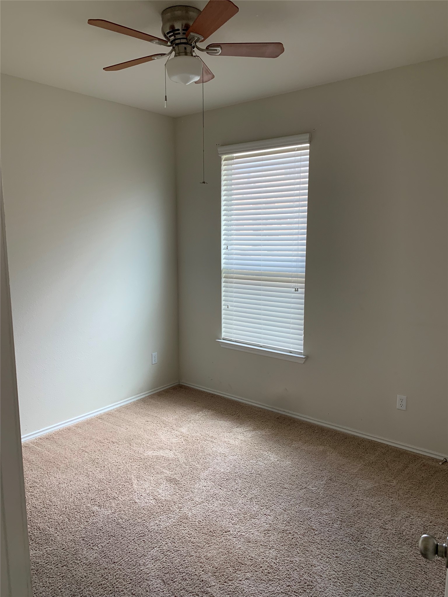 113 Sierra Mar Loop Leander, TX 78641 - Photo 17 of 22 an empty room with a window and a fan