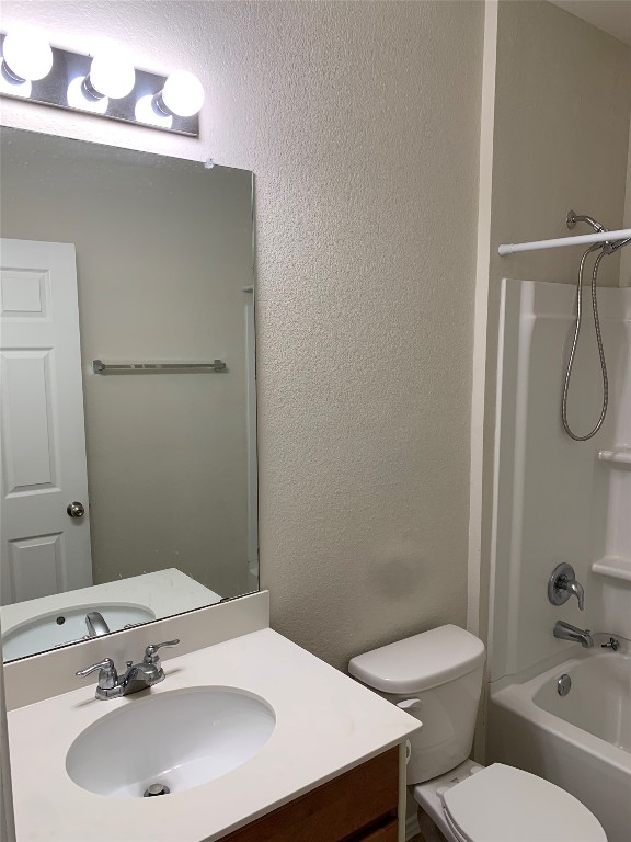 113 Sierra Mar Loop Leander, TX 78641 - Photo 18 of 22 a bathroom with a sink toilet and a mirror