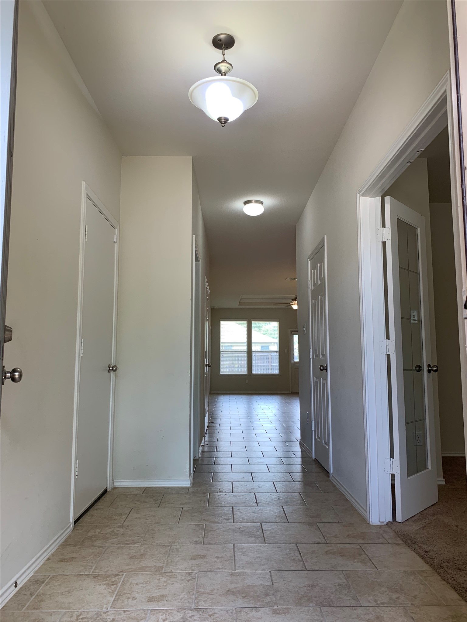 113 Sierra Mar Loop Leander, TX 78641 - Photo 3 of 22 wooden floor in an empty room with a window