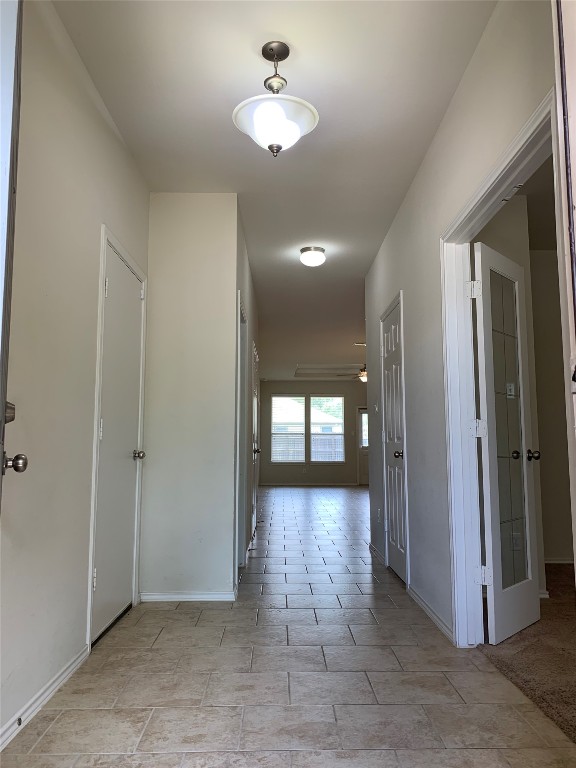 113 Sierra Mar Loop Leander, TX 78641 - Photo 3 of 22 wooden floor in an empty room with a window