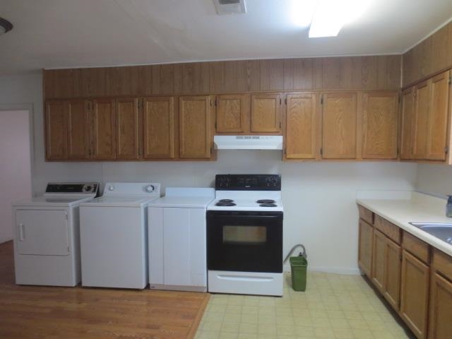 6386 Highway 209 Ripley, TN 38063 - Photo 17 of 23 a kitchen with a cabinets and white appliances