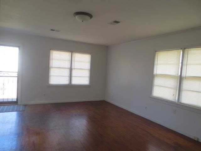 6386 Highway 209 Ripley, TN 38063 - Photo 23 of 23 an empty room with wooden floor and windows