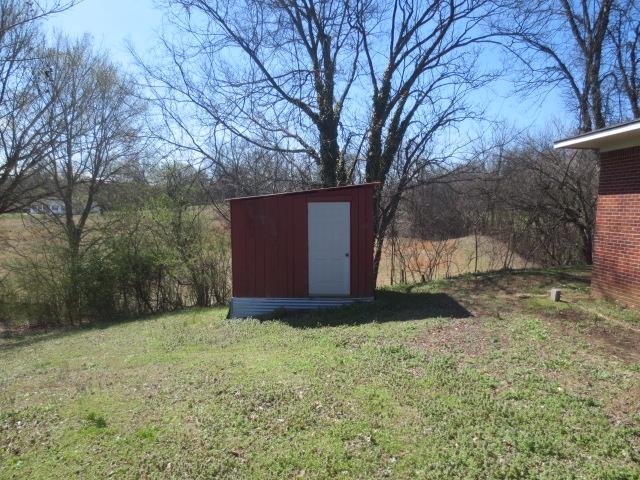 6386 Highway 209 Ripley, TN 38063 - Photo 3 of 23 a view of a yard with large trees