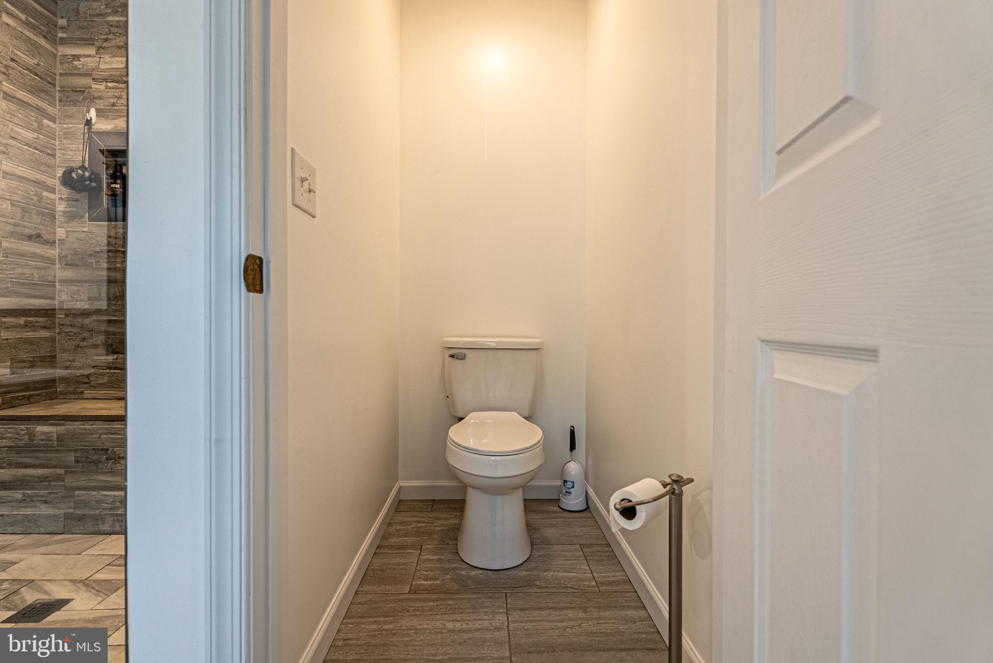 14608 Brant Road Southwest Cresaptown, MD 21502 - Photo 13 of 40 a bathroom with a toilet and a sink
