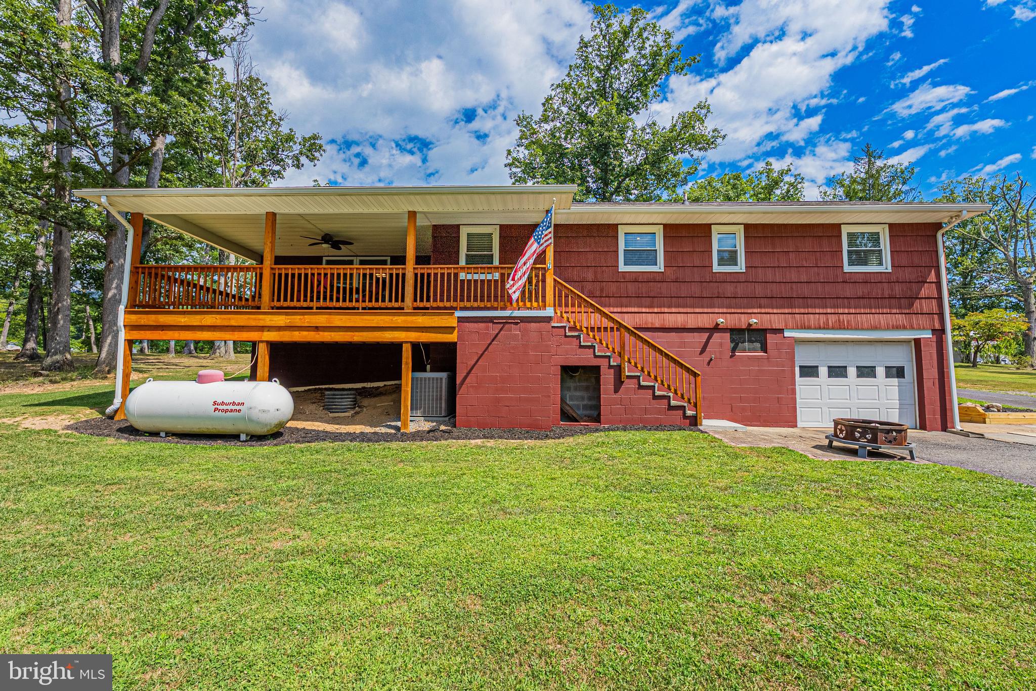 14608 Brant Road Southwest Cresaptown, MD 21502 - Photo 29 of 40 a view of a house with a yard and deck