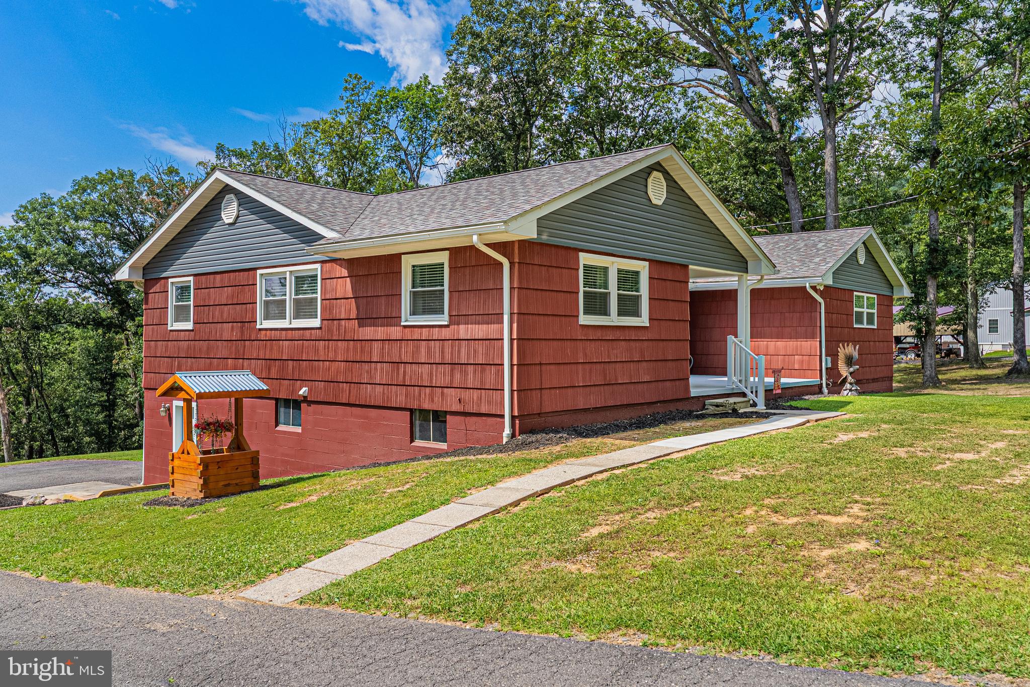 14608 Brant Road Southwest Cresaptown, MD 21502 - Photo 39 of 40 a front view of a house with garden