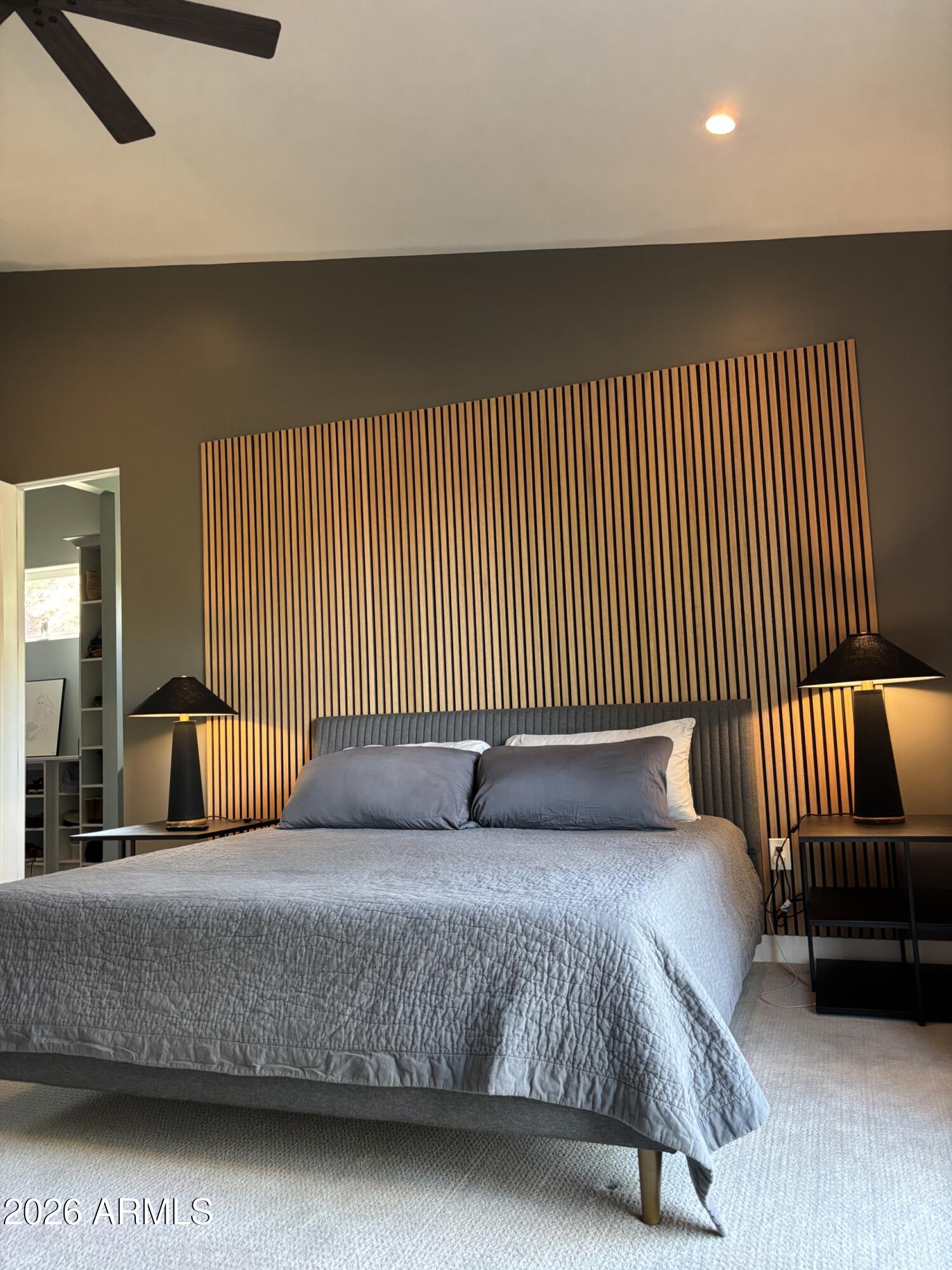 10 Granada Road Sedona, AZ 86336 - Photo 24 of 28 a bedroom with a bed and lamp