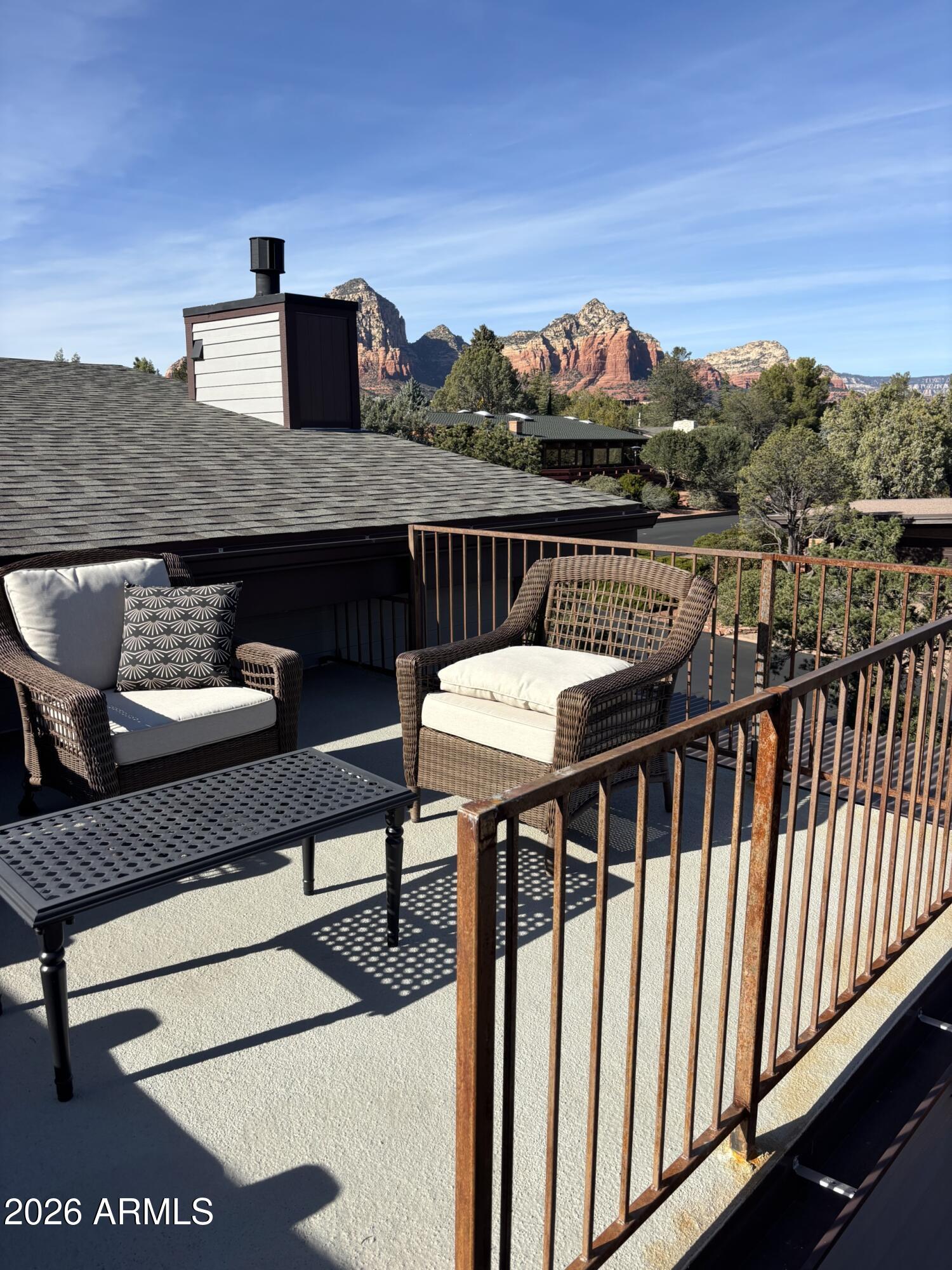 10 Granada Road Sedona, AZ 86336 - Photo 4 of 28 a view of a balcony with chairs