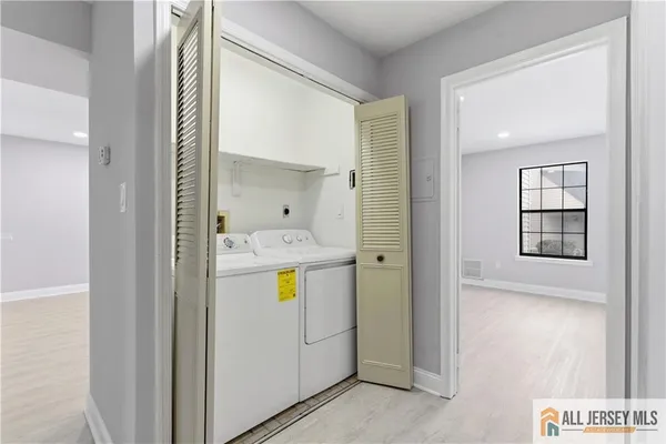 a bathroom with a bathtub and a sink