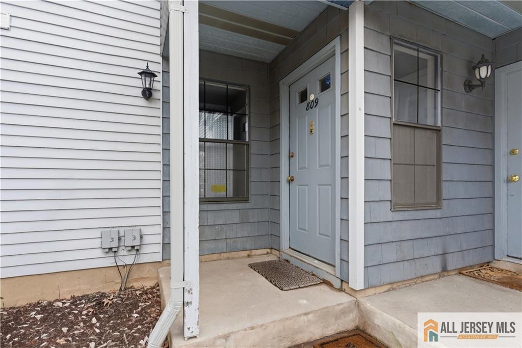 809 Woodbridge Commons Way, Unit 809 Iselin, NJ 08830 - Photo 2 of 16 a view of house exterior