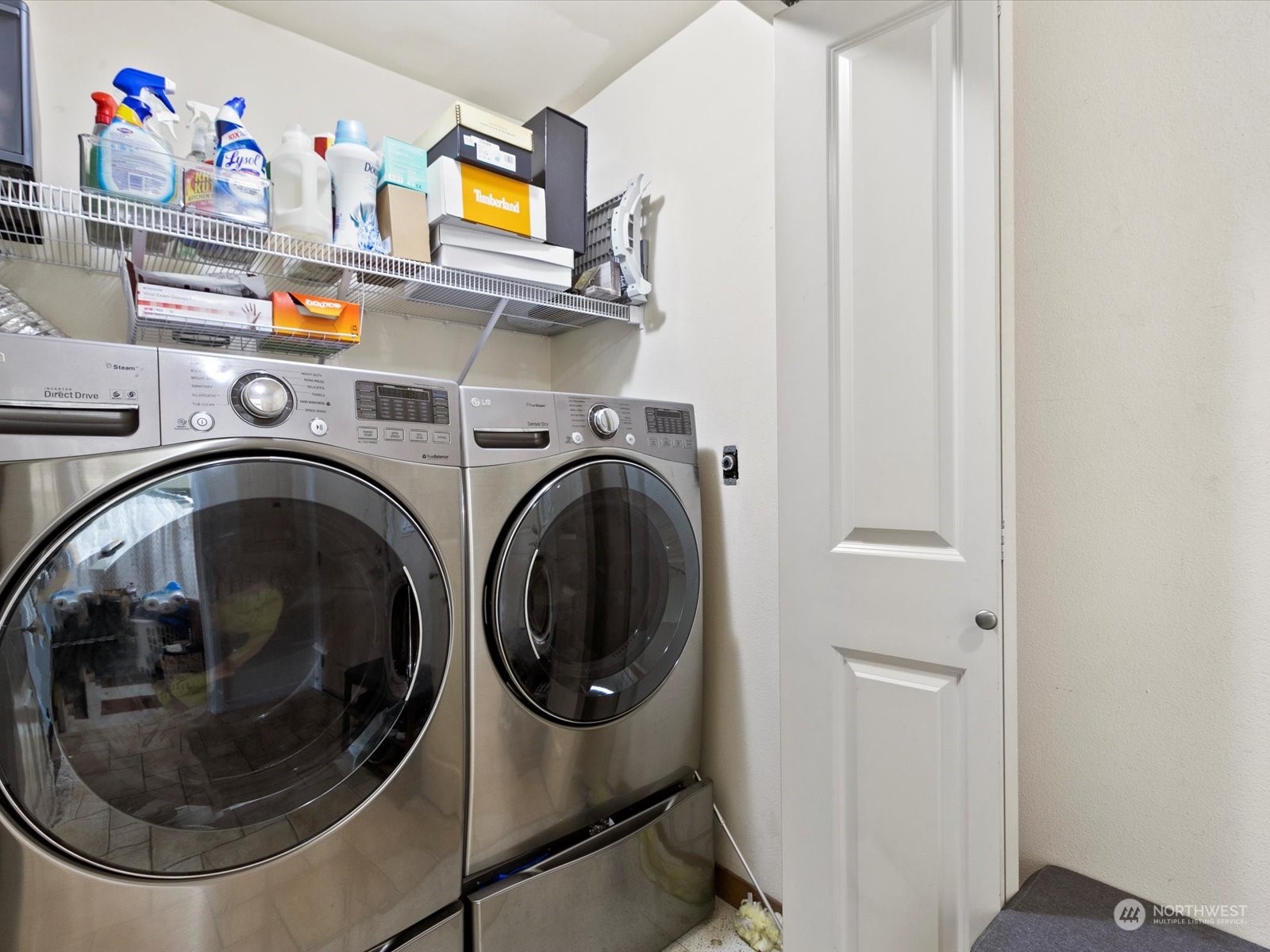 3015 Southwest Avalon Way, Unit 407 Seattle, WA 98126 - Photo 18 of 27 a utility room with dryer and washer