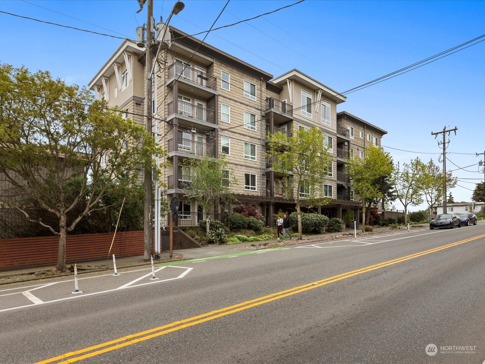 3015 Southwest Avalon Way, Unit 407 Seattle, WA 98126 - Photo 25 of 27 a view of a building and a street