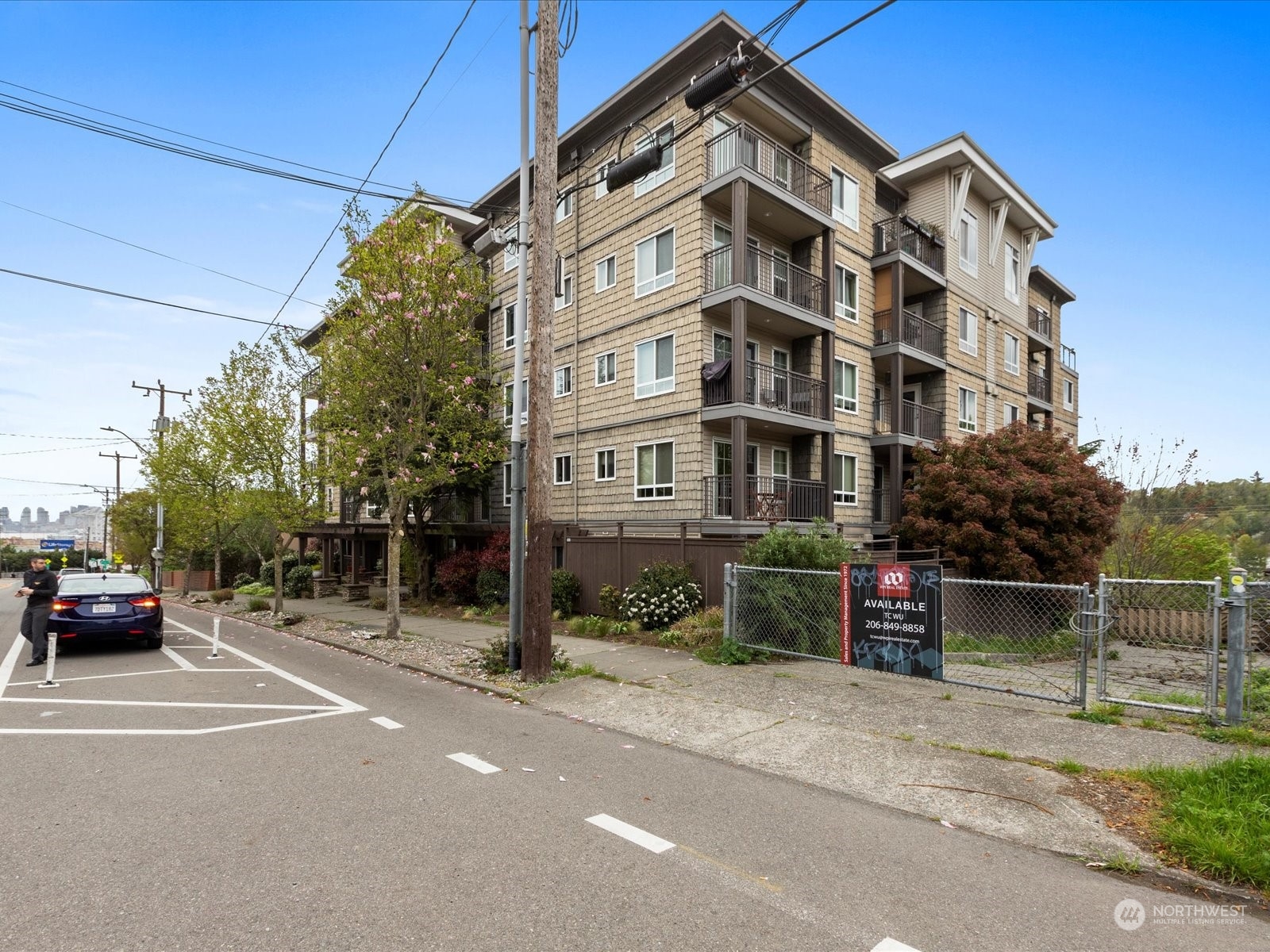 3015 Southwest Avalon Way, Unit 407 Seattle, WA 98126 - Photo 26 of 27 a view of a building with a street