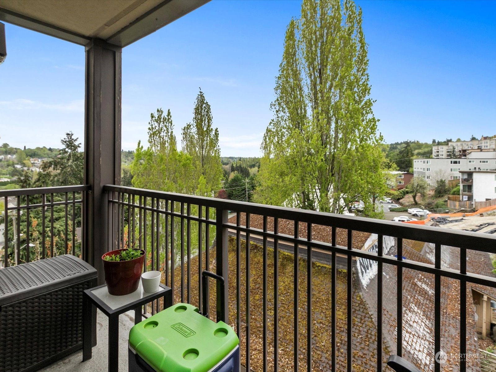 3015 Southwest Avalon Way, Unit 407 Seattle, WA 98126 - Photo 9 of 27 a view of a two chairs in the balcony