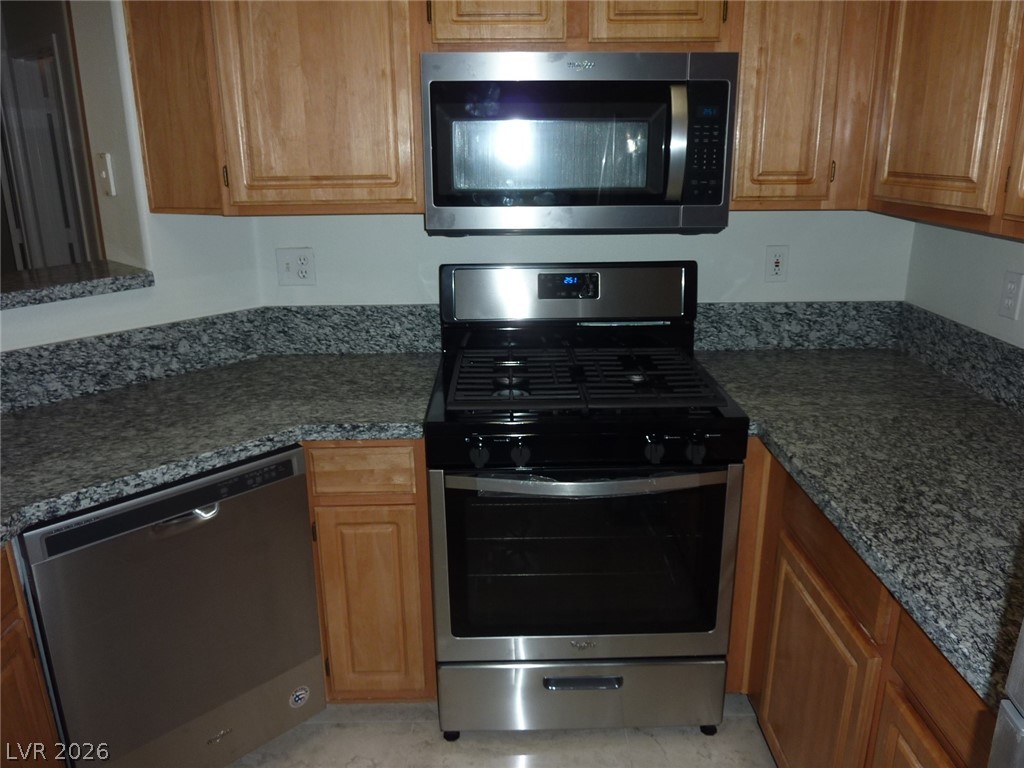 8555 West Russell Road, Unit 2094 Las Vegas, NV 89113 - Photo 11 of 31 Kitchen featuring stainless steel appliances