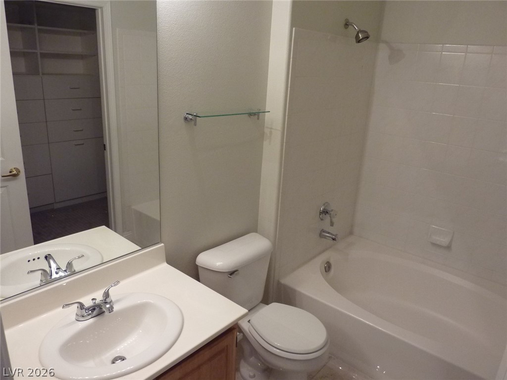 8555 West Russell Road, Unit 2094 Las Vegas, NV 89113 - Photo 15 of 31 Bathroom with vanity and shower / tub combination