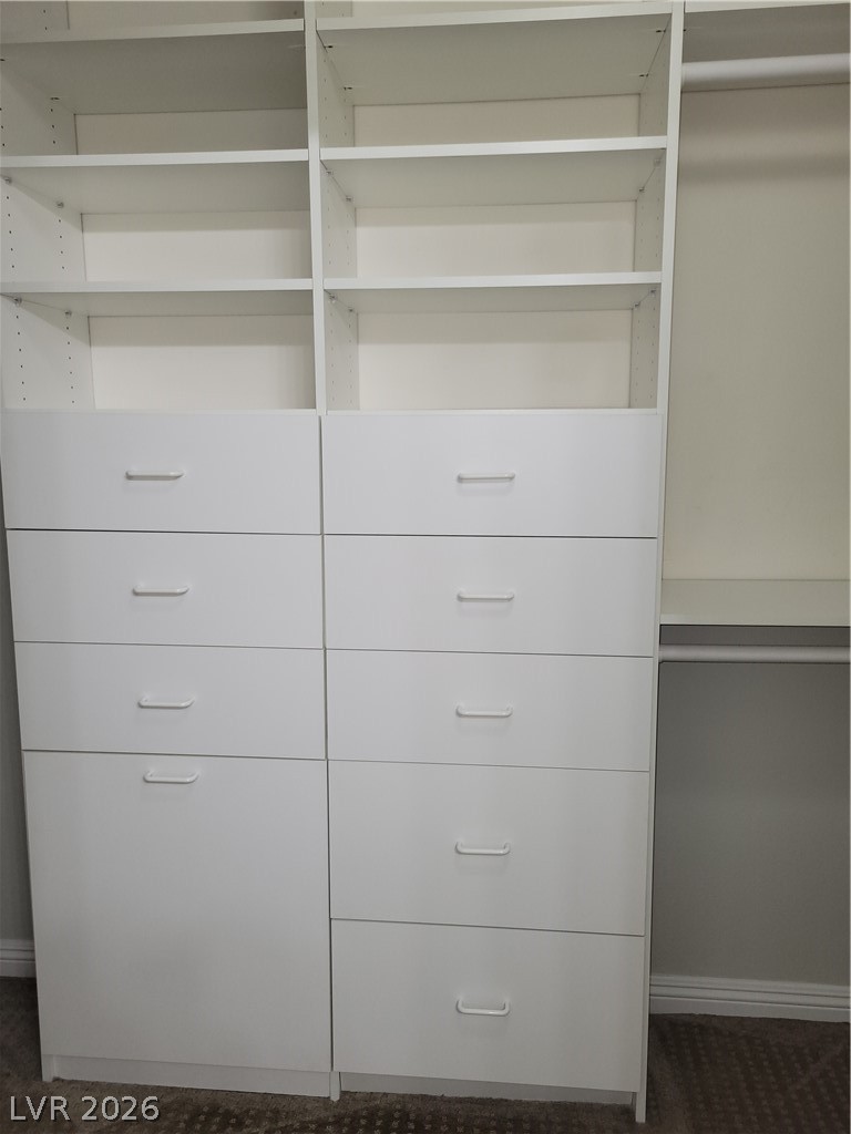 8555 West Russell Road, Unit 2094 Las Vegas, NV 89113 - Photo 17 of 31 Closet in primary bathroom with closet organizer