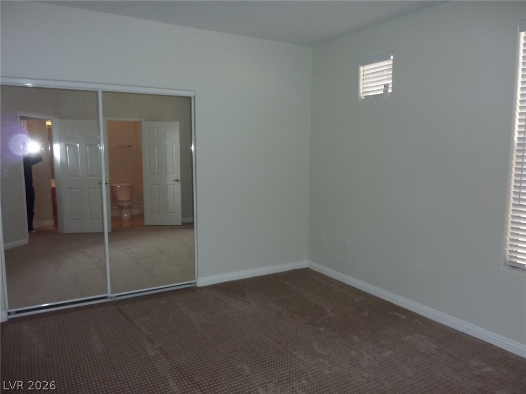 8555 West Russell Road, Unit 2094 Las Vegas, NV 89113 - Photo 19 of 31 Bedroom 2 - with mirrored closet