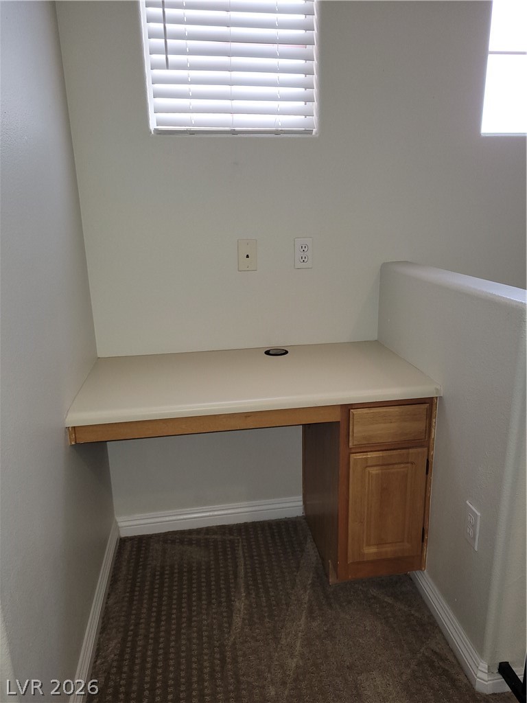 8555 West Russell Road, Unit 2094 Las Vegas, NV 89113 - Photo 5 of 31 Built in desk off of stairway